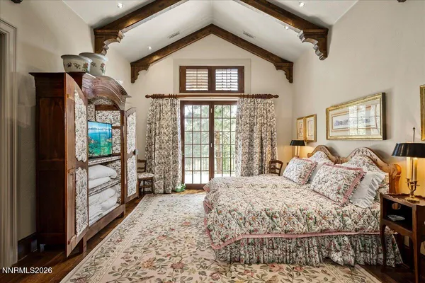 an aerial view of a house with yard swimming pool and outdoor seating