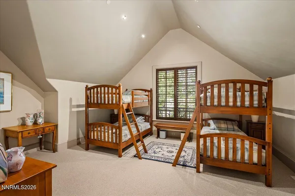 a view of backyard with outdoor seating and green space