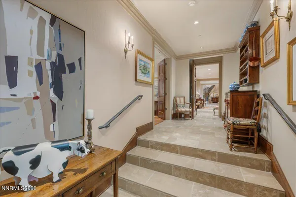 a view of a chairs and table in backyard