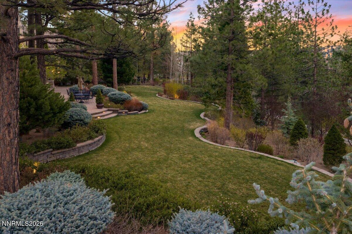 6025 Lake Geneva Drive Reno, NV 89511 - Photo 58 of 72 a view of backyard with outdoor seating and green space