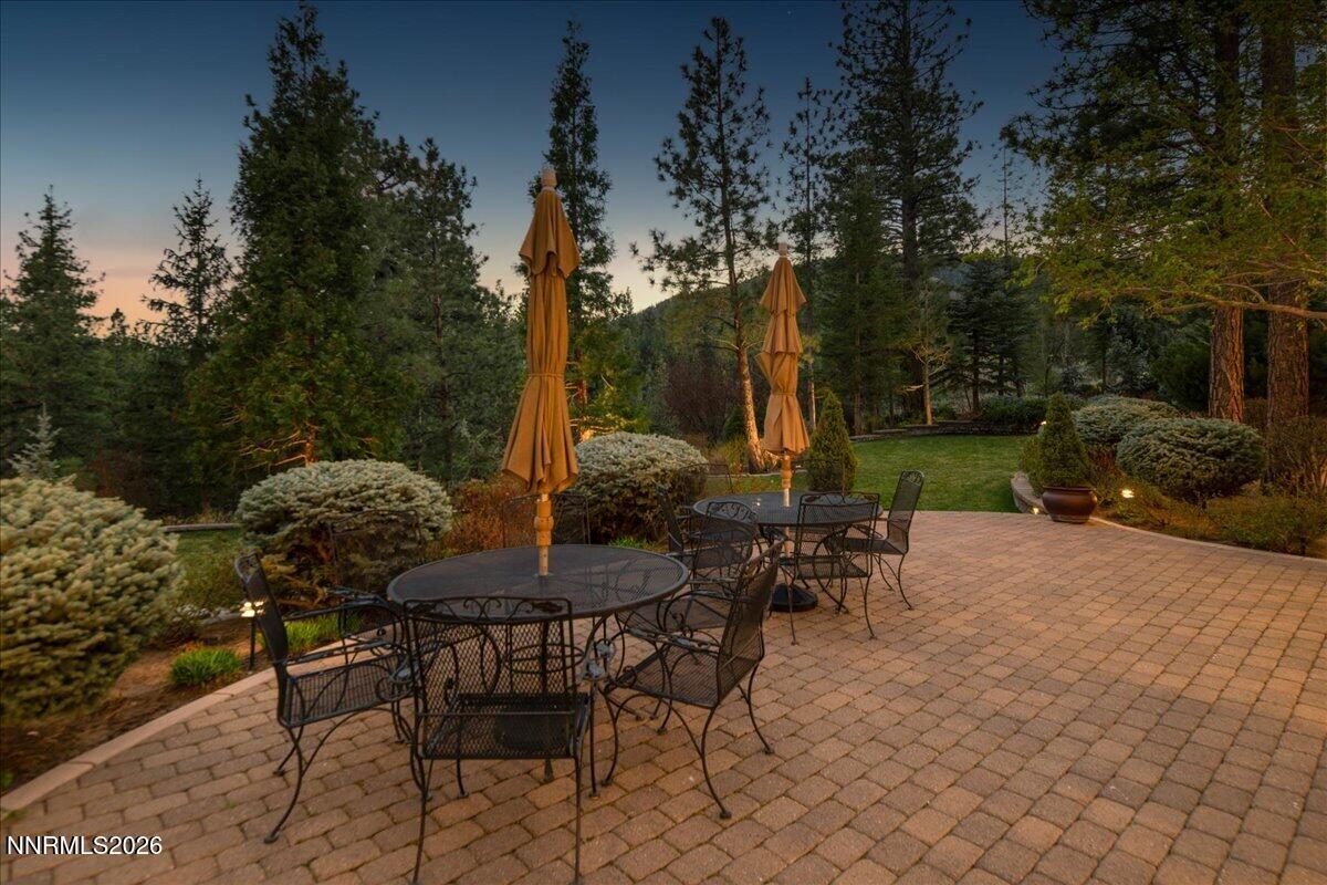 6025 Lake Geneva Drive Reno, NV 89511 - Photo 60 of 72 a view of a chairs and table in backyard
