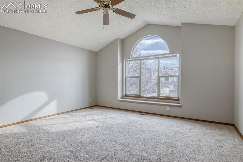 7215 Native Circle Colorado Springs, CO 80919 - Photo 16 of 30 an empty room with a window