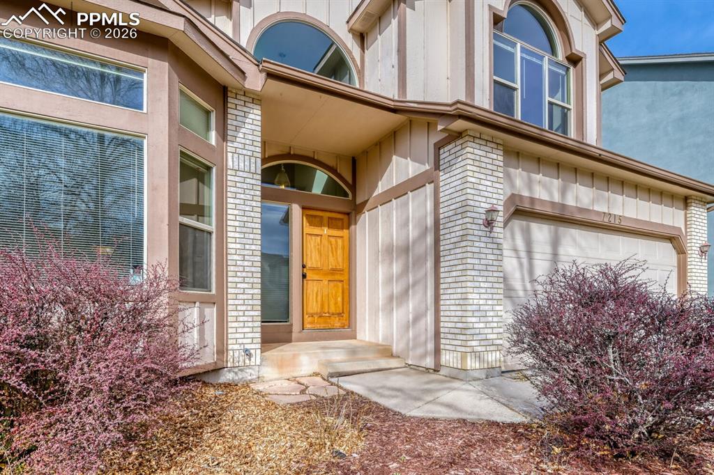 7215 Native Circle Colorado Springs, CO 80919 - Photo 3 of 30 a view of a building with a street view