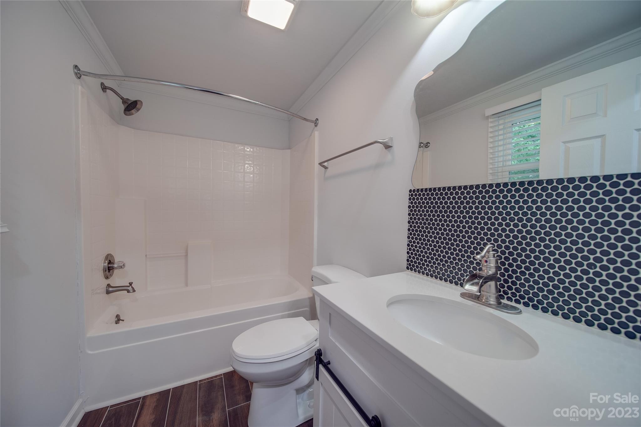 570 Crescent Road Rockwell, NC 28138 - Photo 20 of 28 a bathroom with a sink toilet and shower