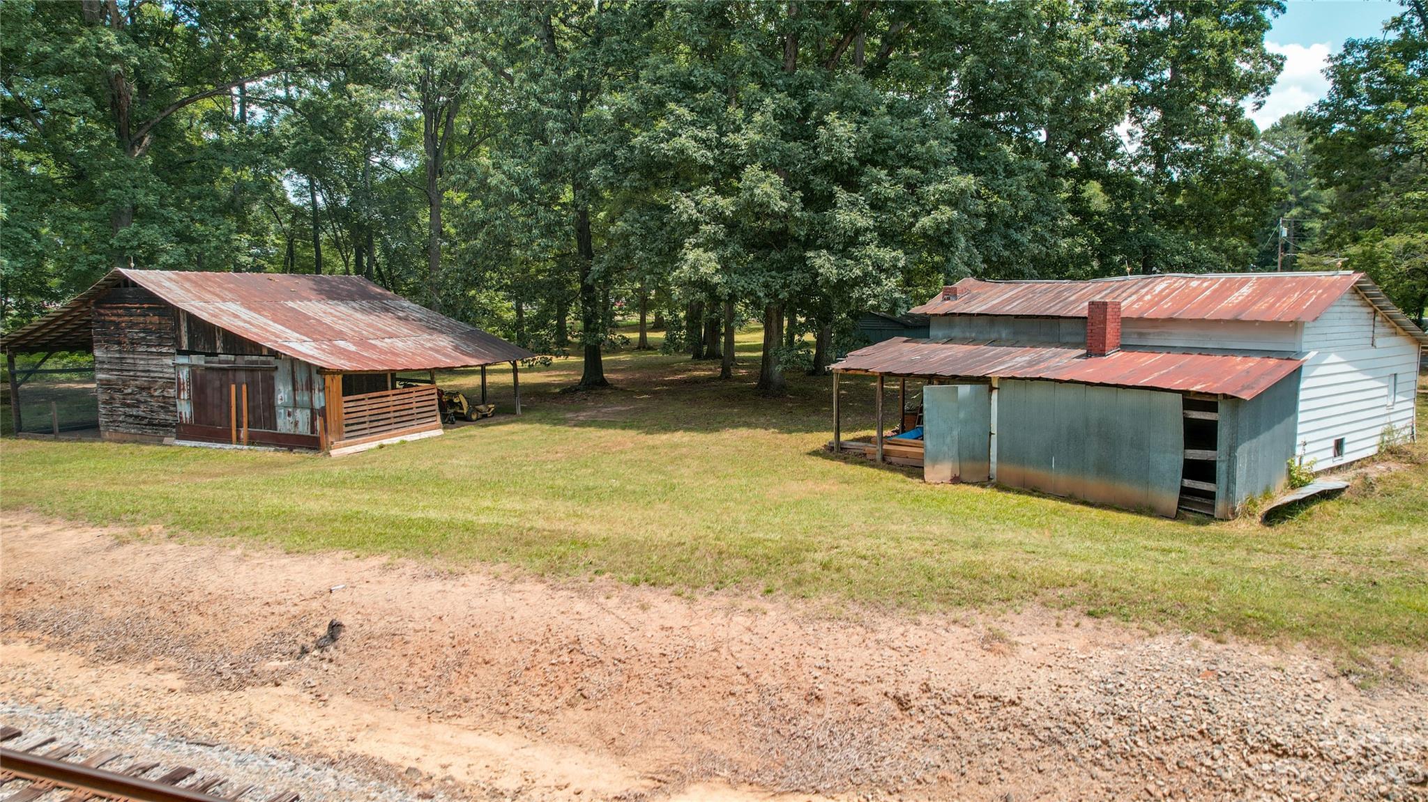 570 Crescent Road Rockwell, NC 28138 - Photo 25 of 28 a view of a house with a yard and sitting area