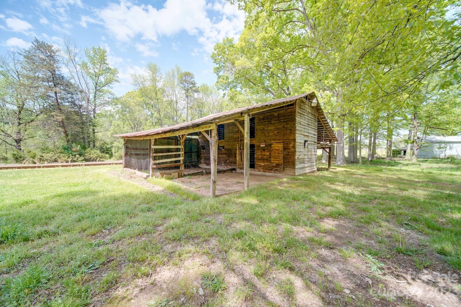570 Crescent Road Rockwell, NC 28138 - Photo 28 of 28 a front view of a house with a yard