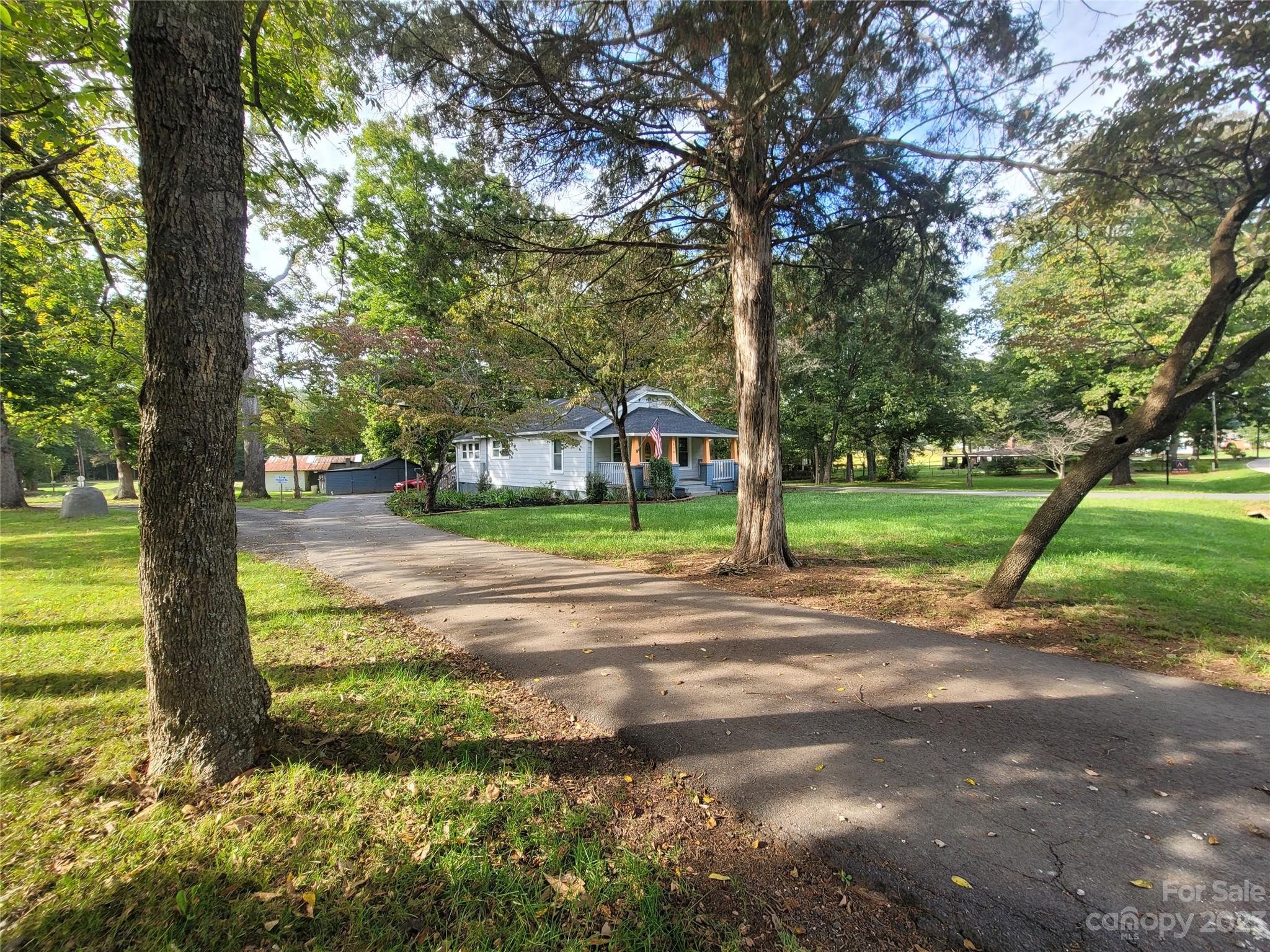 570 Crescent Road Rockwell, NC 28138 - Photo 4 of 28 a view of street with tree s