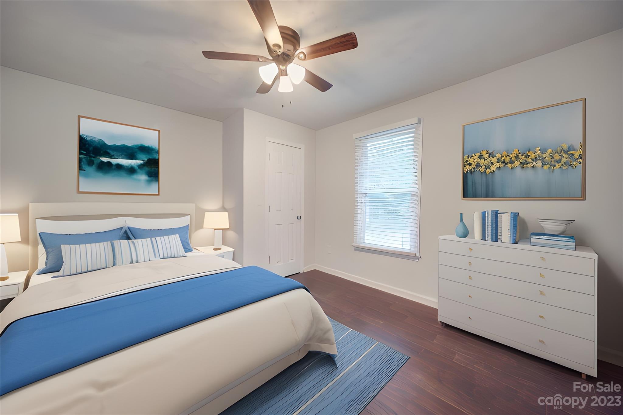 570 Crescent Road Rockwell, NC 28138 - Photo 7 of 28 a bedroom with a large bed and a chandelier