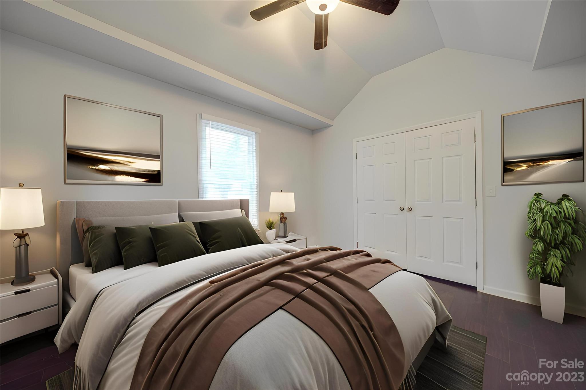 570 Crescent Road Rockwell, NC 28138 - Photo 10 of 28 a bedroom with a bed and a chandelier