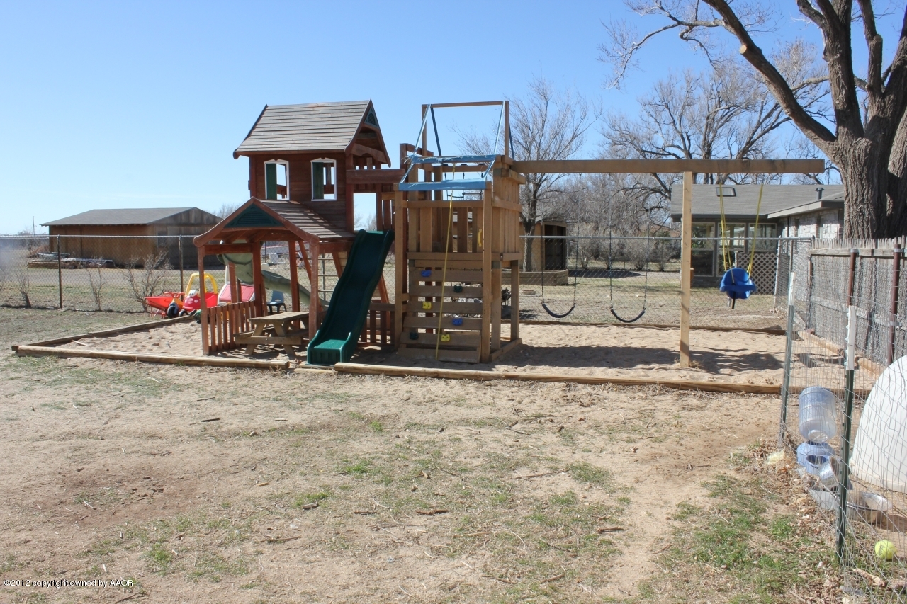 3609 Beacon Road Amarillo, TX 79118 - Photo 23 of 26 a view of a house with a snow on the road