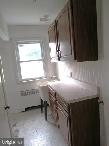a utility room with washer and dryer