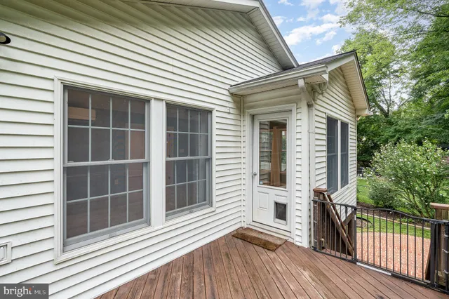 a view of a house with a large window