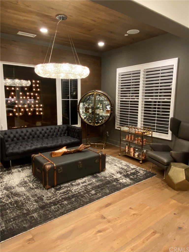 114 Joshua Tree Irvine, CA 92620 - Photo 14 of 73 a living room with furniture a window and a fireplace