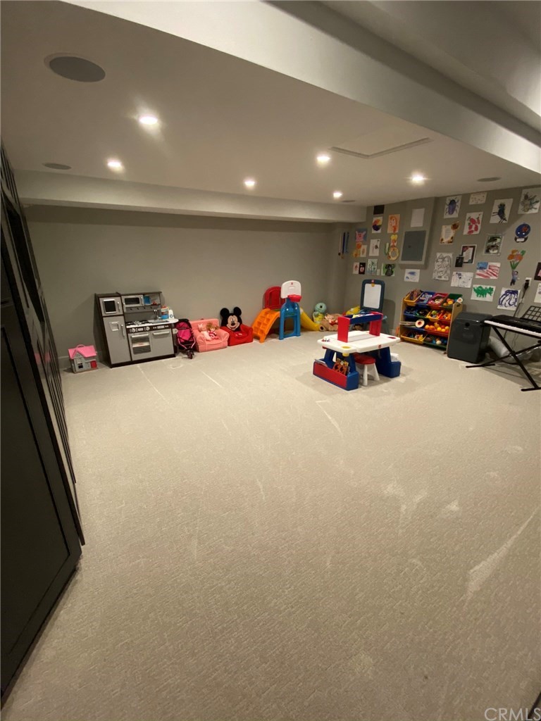 114 Joshua Tree Irvine, CA 92620 - Photo 18 of 73 a view of a room with gym equipment