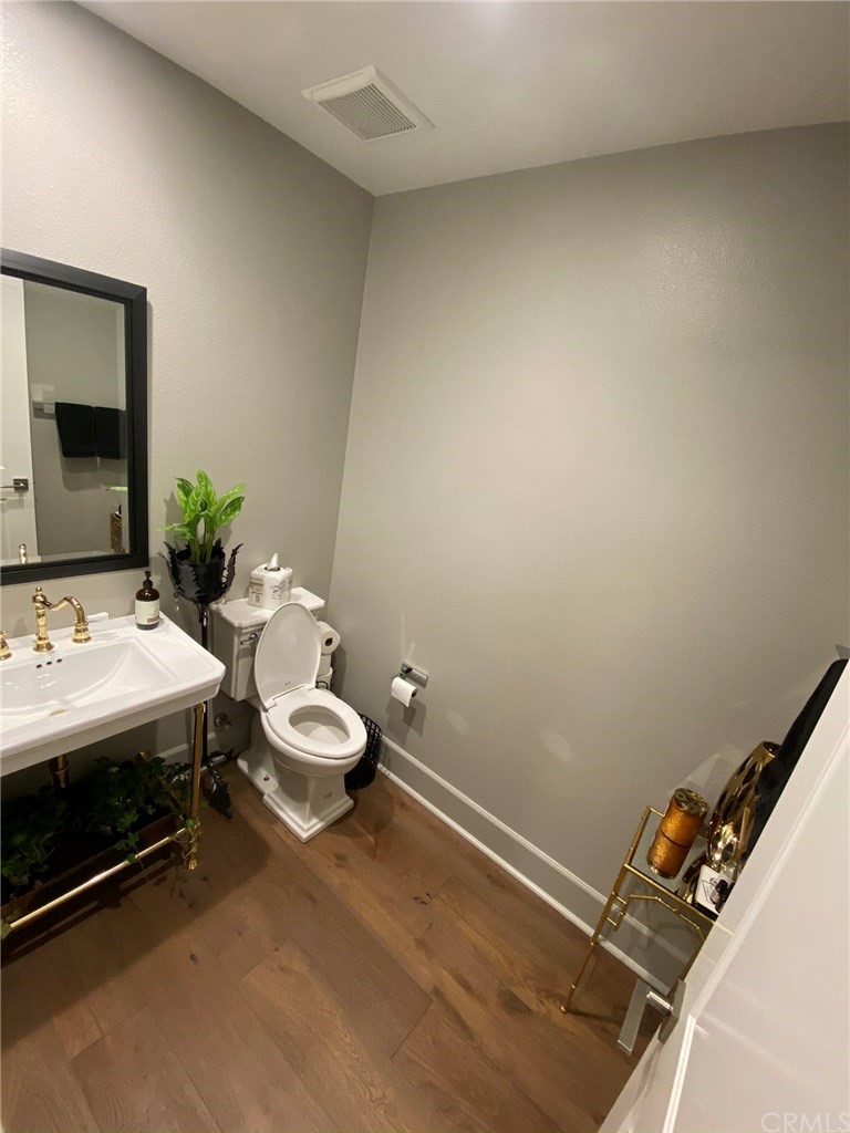 114 Joshua Tree Irvine, CA 92620 - Photo 24 of 73 a bathroom with a sink and a mirror