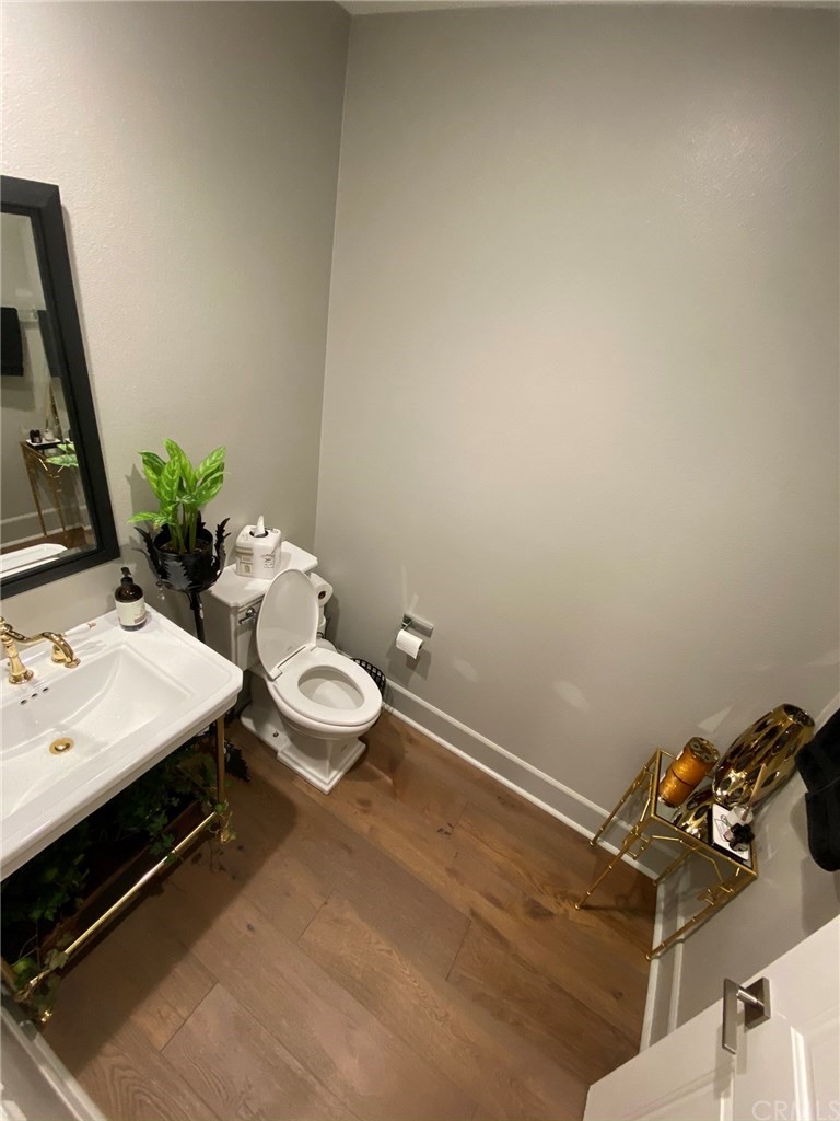114 Joshua Tree Irvine, CA 92620 - Photo 25 of 73 a bathroom with a granite countertop sink and a mirror