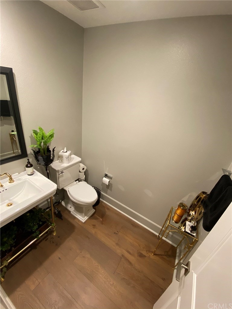 114 Joshua Tree Irvine, CA 92620 - Photo 26 of 73 a bathroom with a sink and a toilet