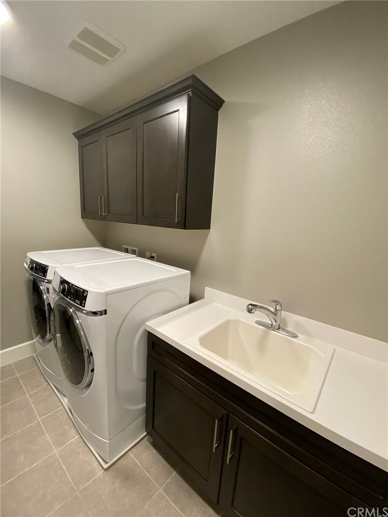 114 Joshua Tree Irvine, CA 92620 - Photo 37 of 73 a utility room with dryer and washer