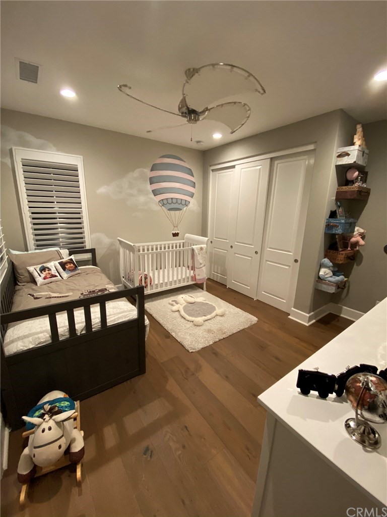 114 Joshua Tree Irvine, CA 92620 - Photo 39 of 73 a bedroom with furniture and window