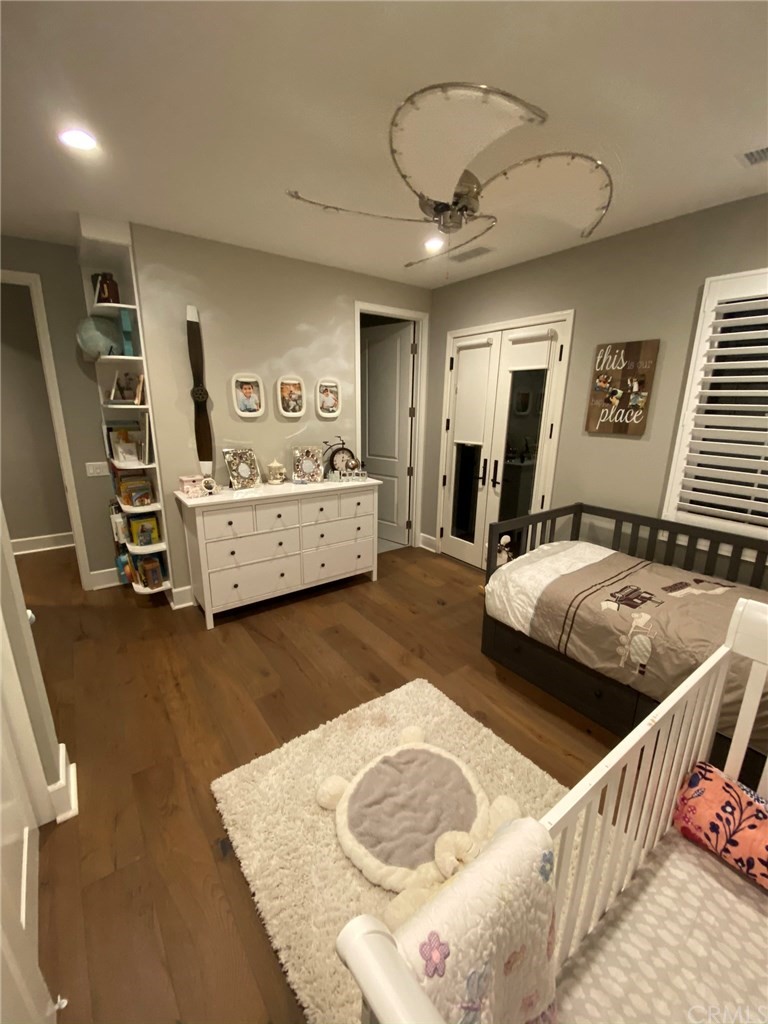 114 Joshua Tree Irvine, CA 92620 - Photo 40 of 73 a living room with furniture and a flat screen tv