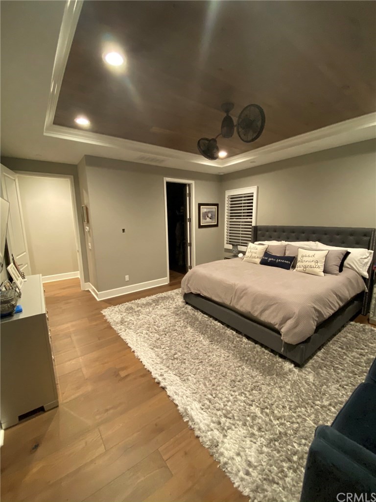 114 Joshua Tree Irvine, CA 92620 - Photo 42 of 73 a bedroom with a large bed and a large window