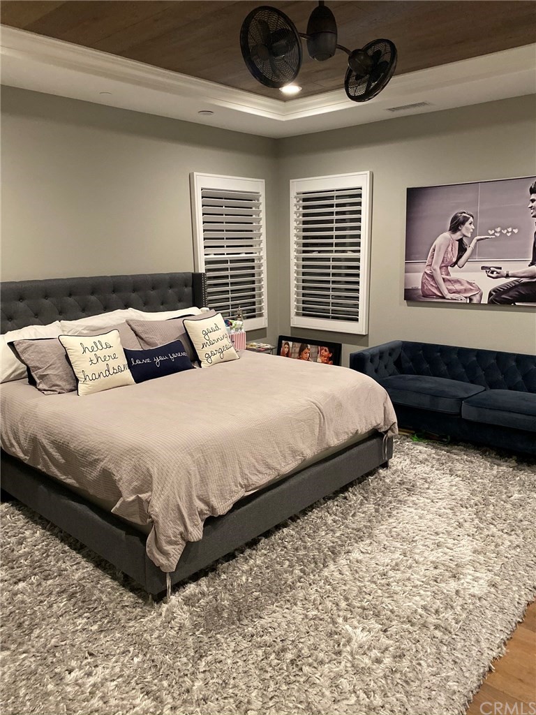 114 Joshua Tree Irvine, CA 92620 - Photo 43 of 73 a bedroom with a large bed and a window