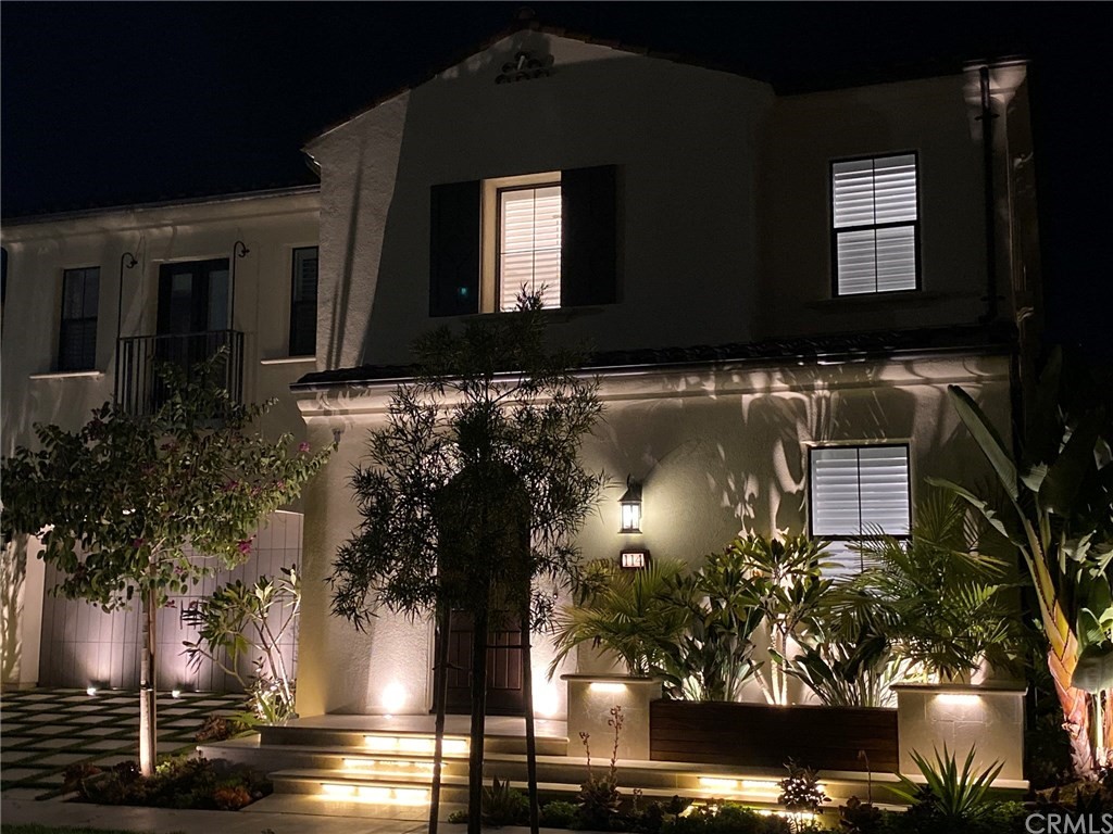 114 Joshua Tree Irvine, CA 92620 - Photo 70 of 73 a front view of house with yard