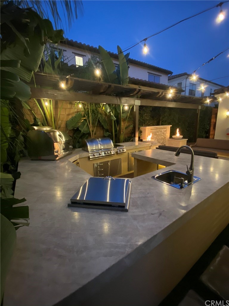 114 Joshua Tree Irvine, CA 92620 - Photo 9 of 73 a view of a room with gym equipment