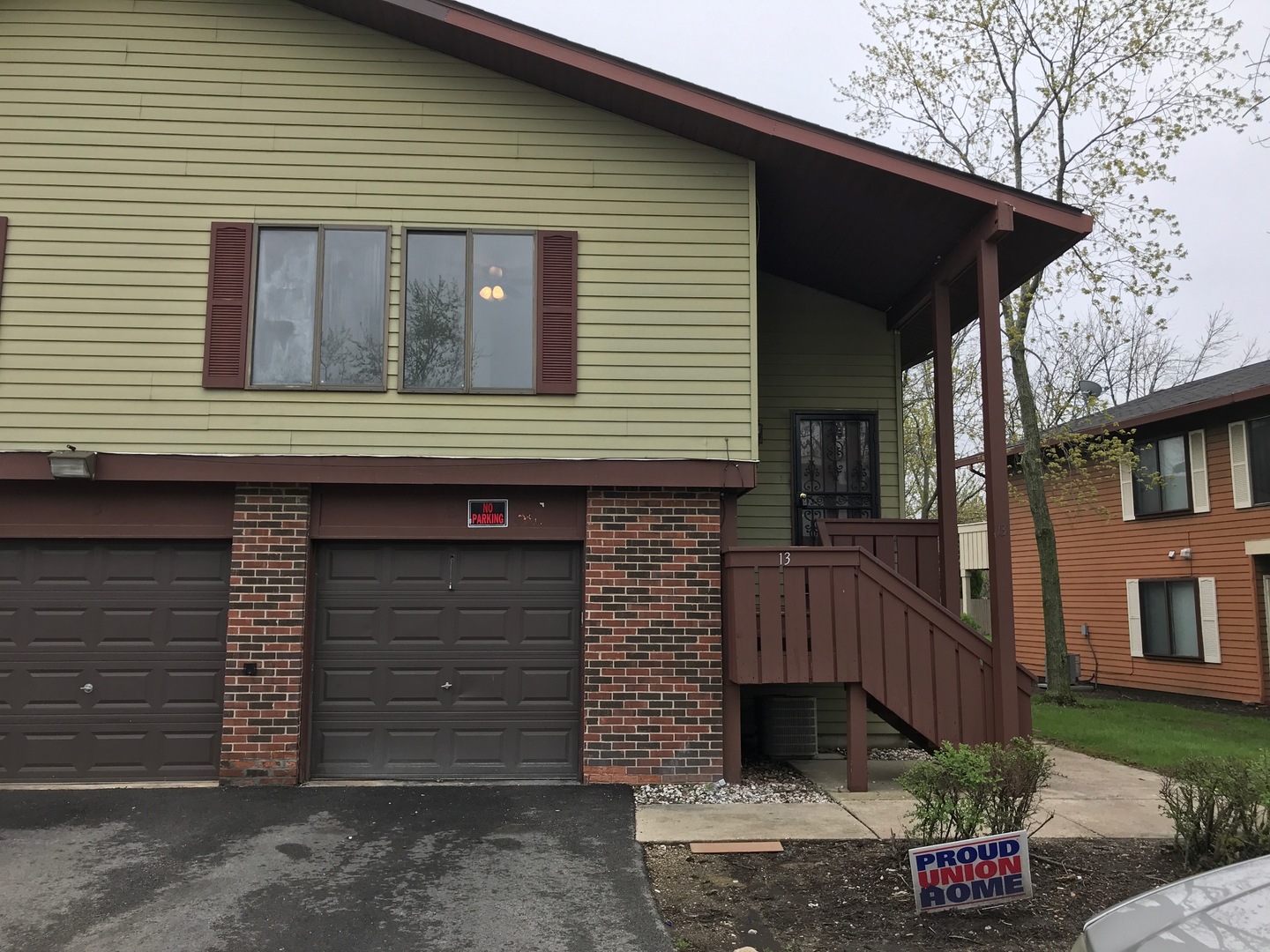 13 Elm Court, Unit 1 Bolingbrook, IL 60440 - Photo 1 of 1 a front view of a house with a garage