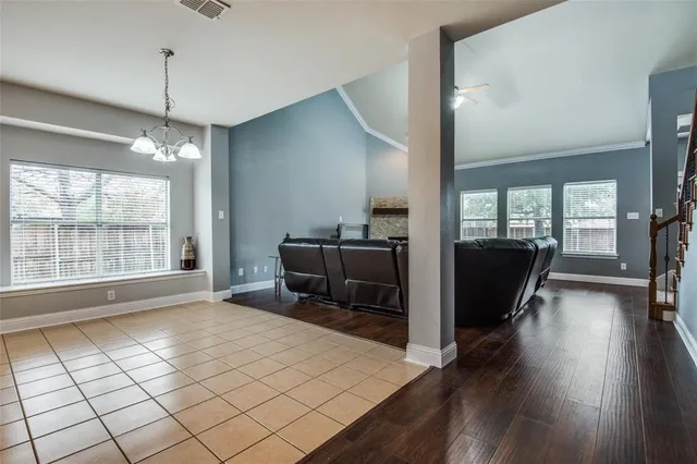 a kitchen with a refrigerator a sink and a stove top oven