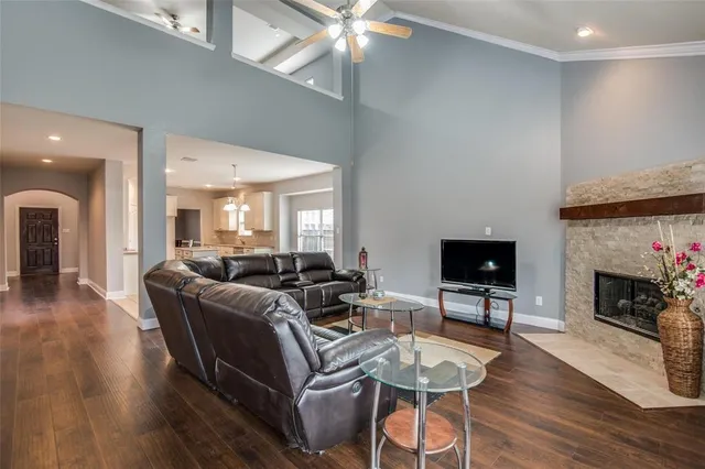 a view of a livingroom with furniture window and wooden floor