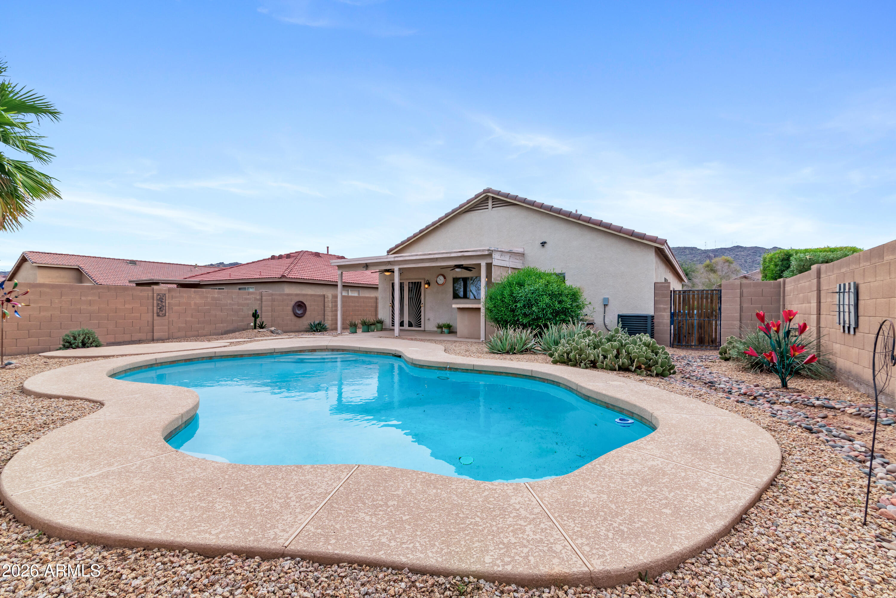 930 East Pedro Road Phoenix, AZ 85042 - Photo 25 of 34 a view of a house with swimming pool