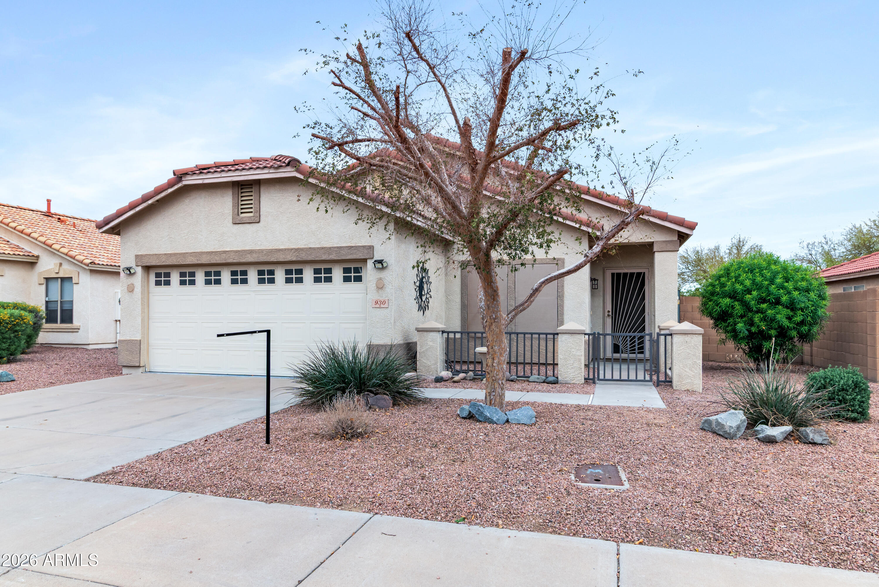 930 East Pedro Road Phoenix, AZ 85042 - Photo 29 of 34 a view of a house with a yard and tree