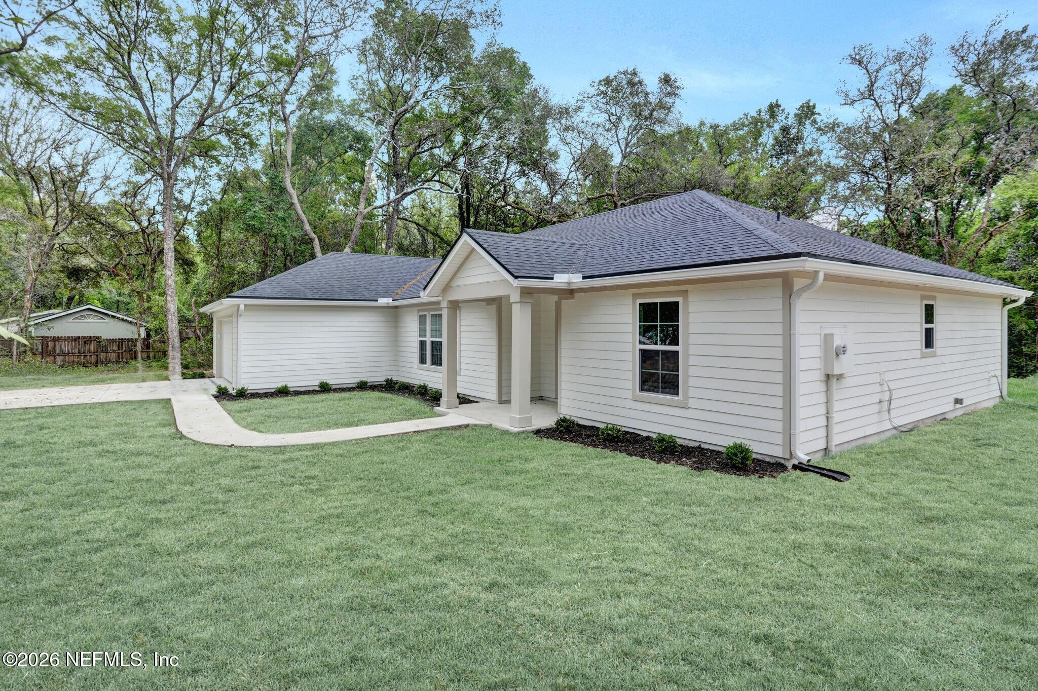 4881 Chickpea Street Middleburg, FL 32068 - Photo 1 of 19 a view of a house with a yard