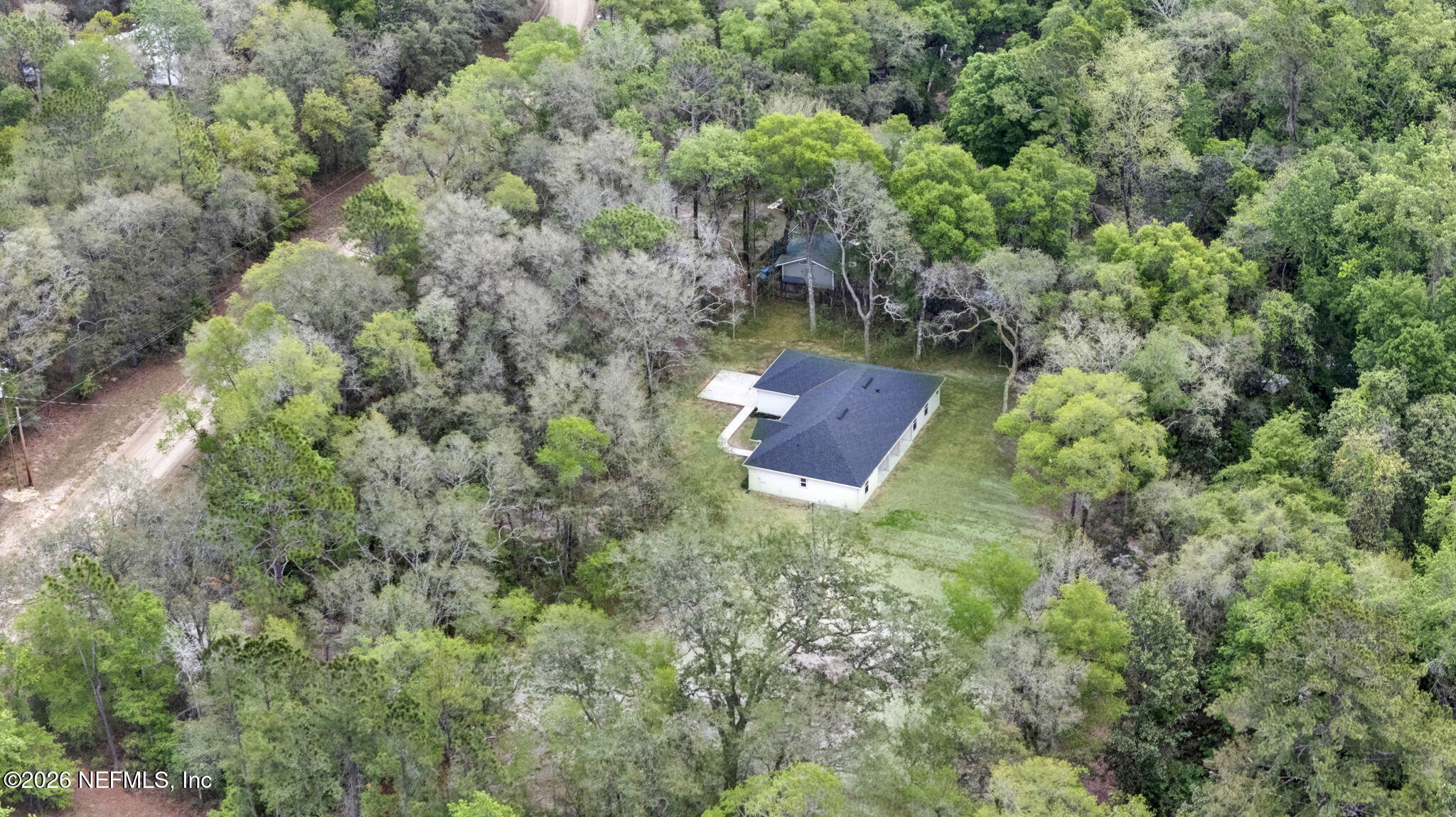 4881 Chickpea Street Middleburg, FL 32068 - Photo 18 of 19 an aerial view of house with yard