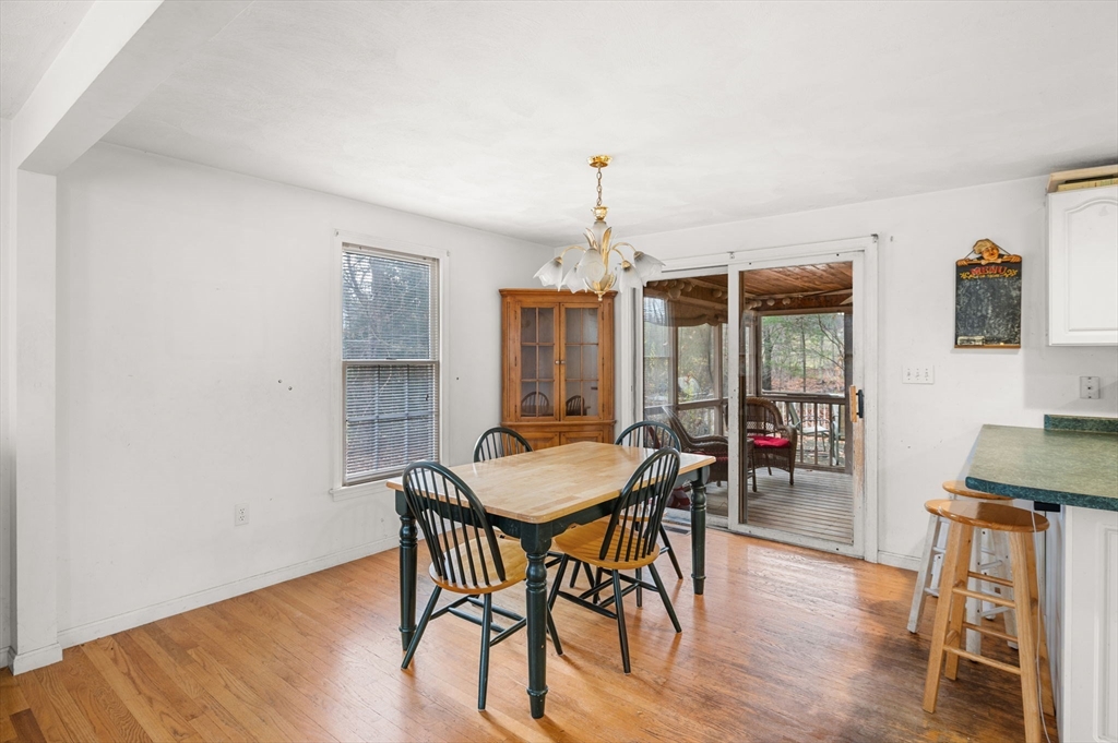 328 East Broadway Haverhill, MA 01830 - Photo 13 of 37 a view of a dining room with furniture window and wooden floor