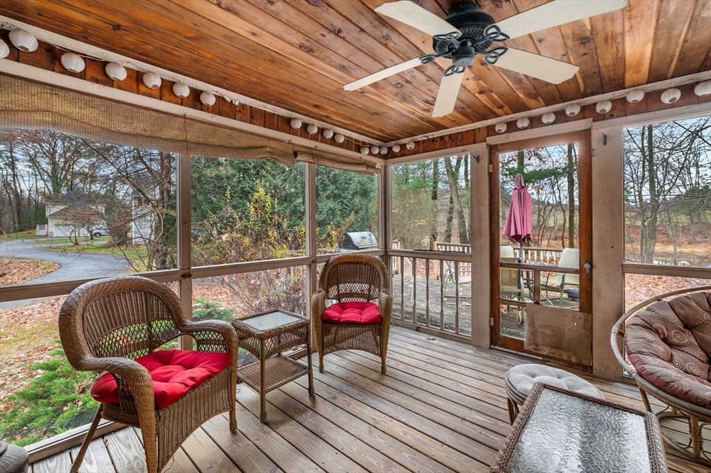 328 East Broadway Haverhill, MA 01830 - Photo 16 of 37 a balcony with furniture and wooden floor