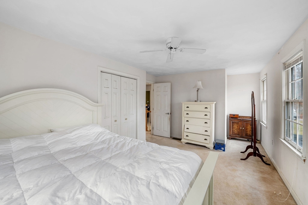 328 East Broadway Haverhill, MA 01830 - Photo 26 of 37 a bedroom with a large bed and a window