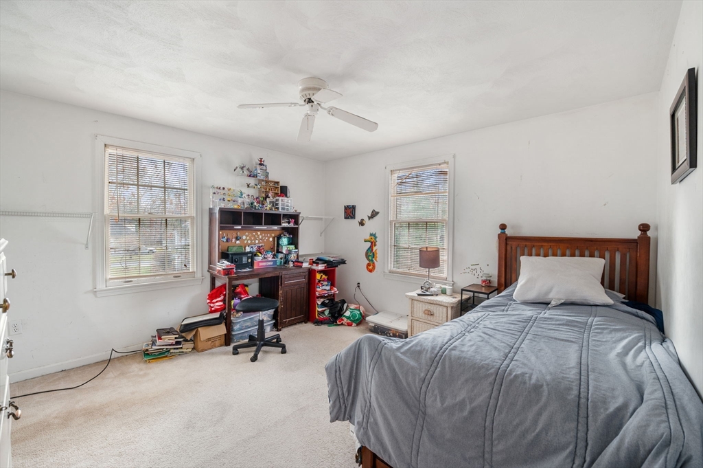 328 East Broadway Haverhill, MA 01830 - Photo 27 of 37 a bedroom with bed and a window