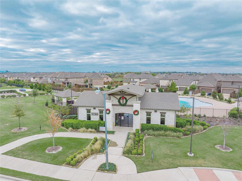 8211 Agarito Way Dallas, TX 75252 - Photo 31 of 34 a view of building with yard