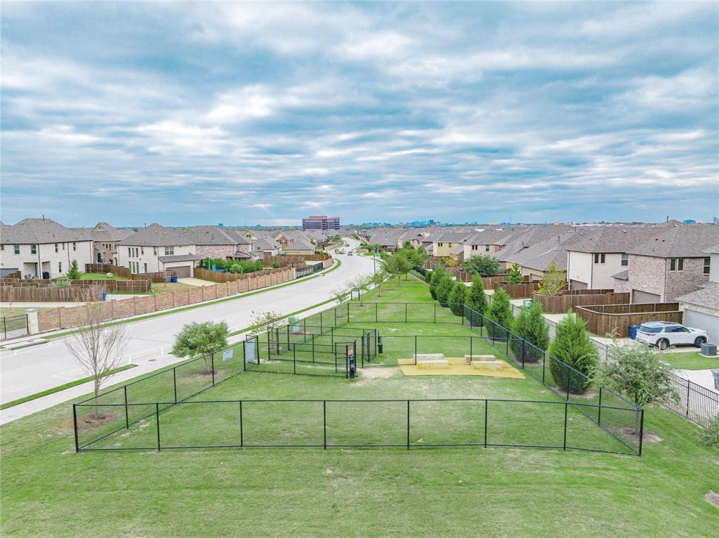 8211 Agarito Way Dallas, TX 75252 - Photo 33 of 34 a view of a tennis court