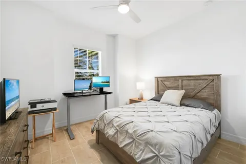 a view of a backyard with sitting area