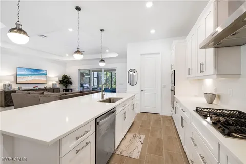 a living room with furniture and a table