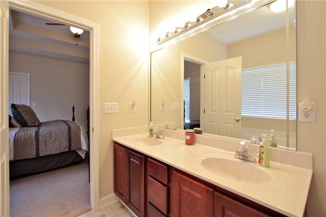 7239 Cox Pike Fairview, TN 37062 - Photo 12 of 19 The master bathroom has double vanities and separate shower and tub