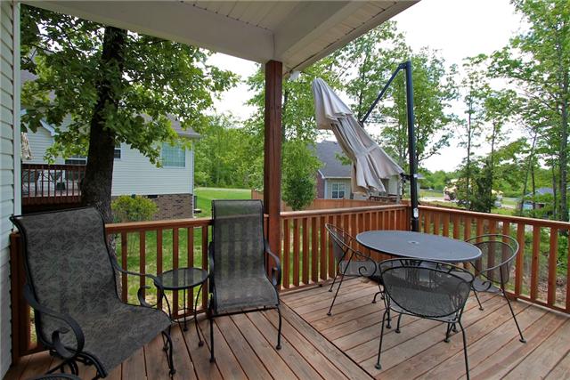 7239 Cox Pike Fairview, TN 37062 - Photo 17 of 19 The covered deck is the perfect place to sit and enjoy a summer evening