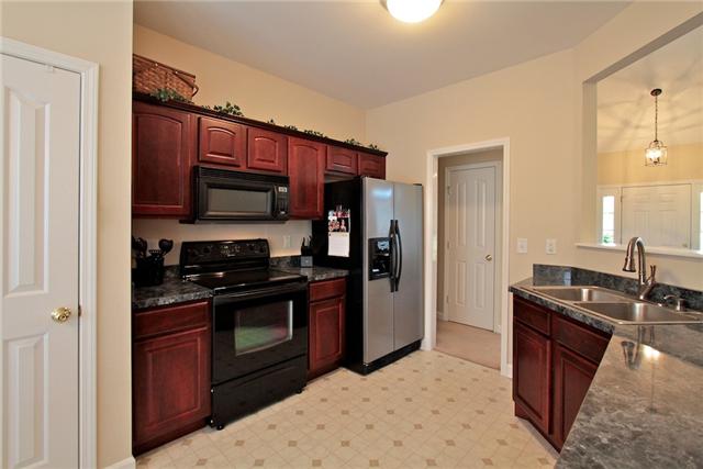 7239 Cox Pike Fairview, TN 37062 - Photo 7 of 19 The kitchen has a breakfast nook and pantry