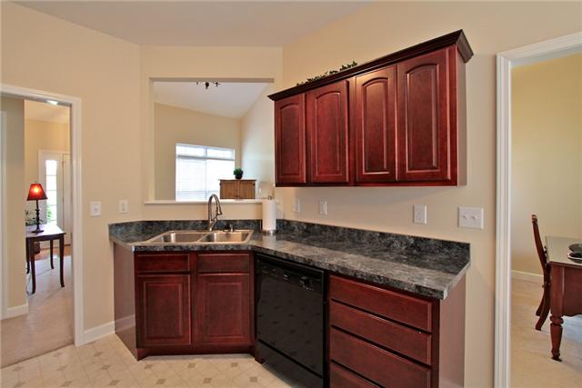 7239 Cox Pike Fairview, TN 37062 - Photo 8 of 19 The pass through between the kitchen and living room means you won't miss out on any family time while in the kitchen