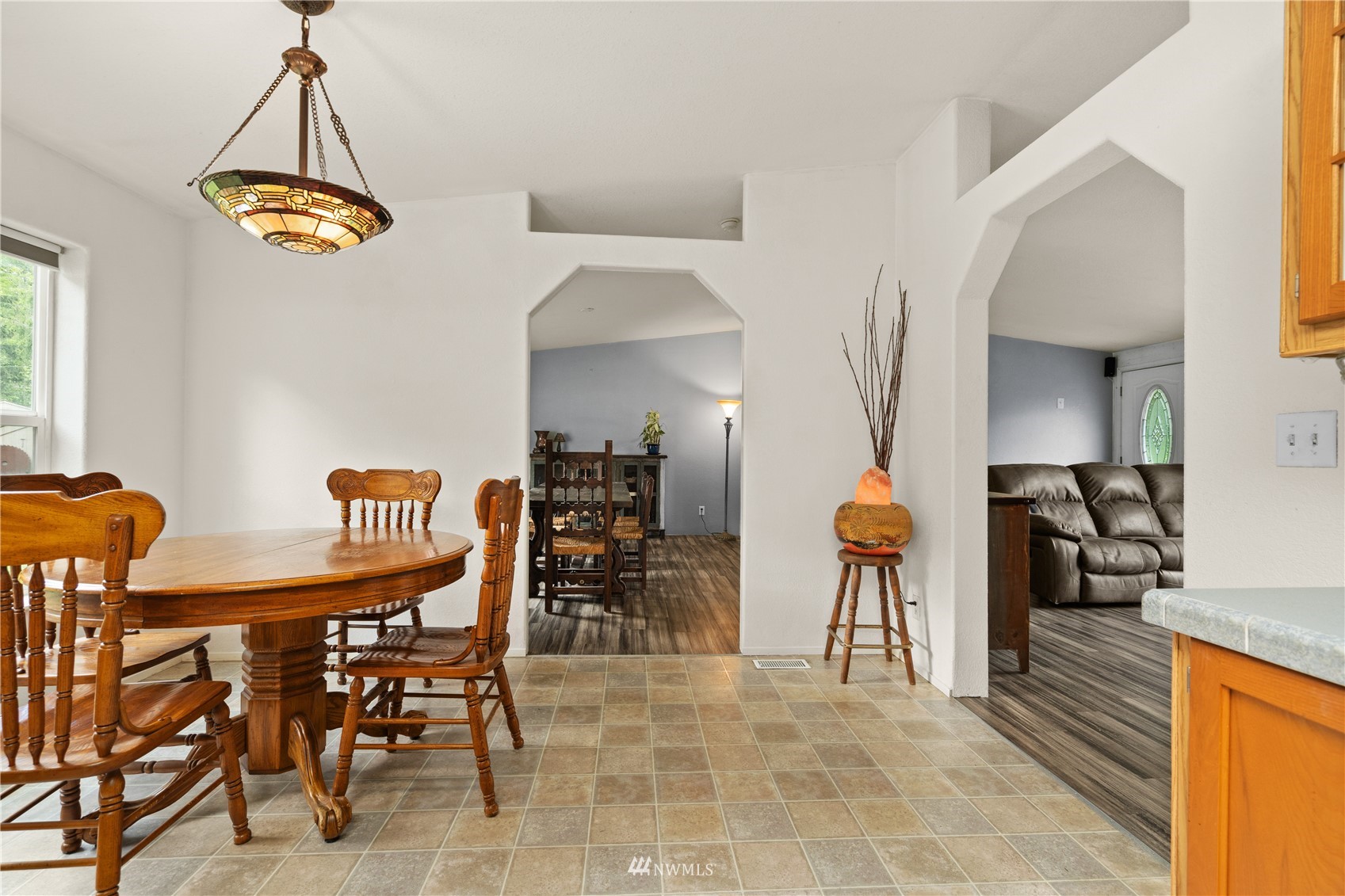 16227 OK Mill Road Snohomish, WA 98290 - Photo 11 of 38 a view of a dining room with furniture