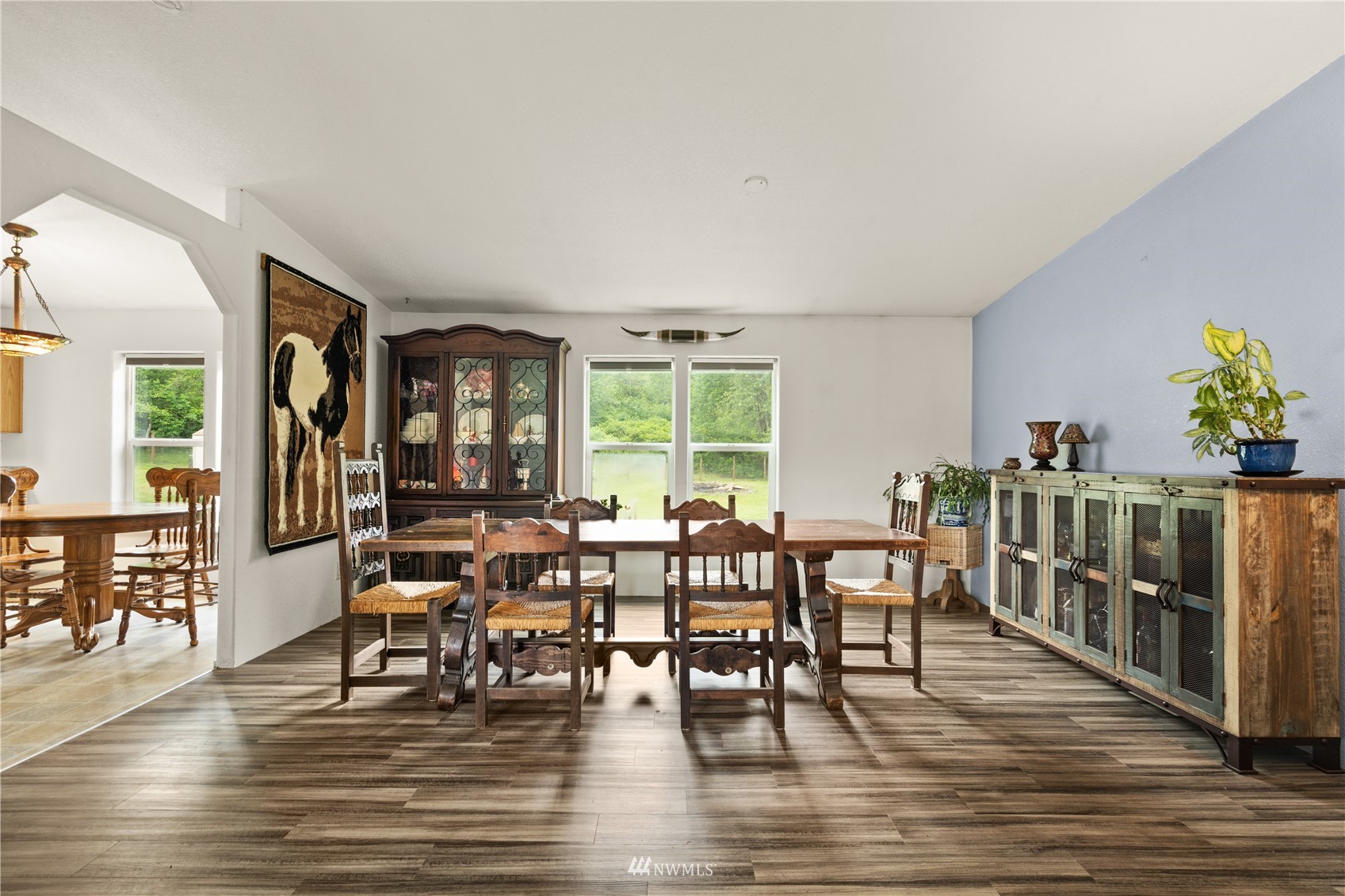 16227 OK Mill Road Snohomish, WA 98290 - Photo 20 of 38 a view of a dining room with furniture and wooden floor
