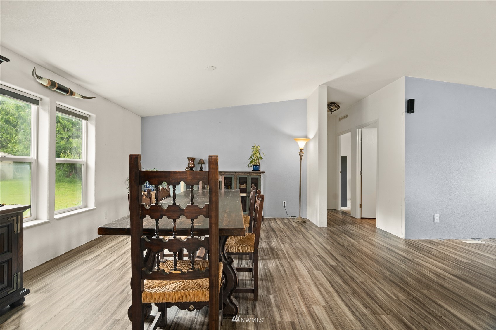 16227 OK Mill Road Snohomish, WA 98290 - Photo 21 of 38 a view of a dining room with furniture window and wooden floor